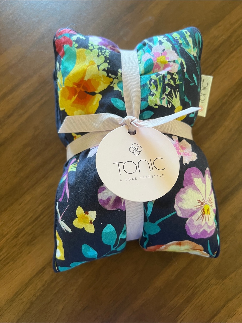 TONIC Floral neck Pillow - Navy Background with Yellow & Purple Flowers